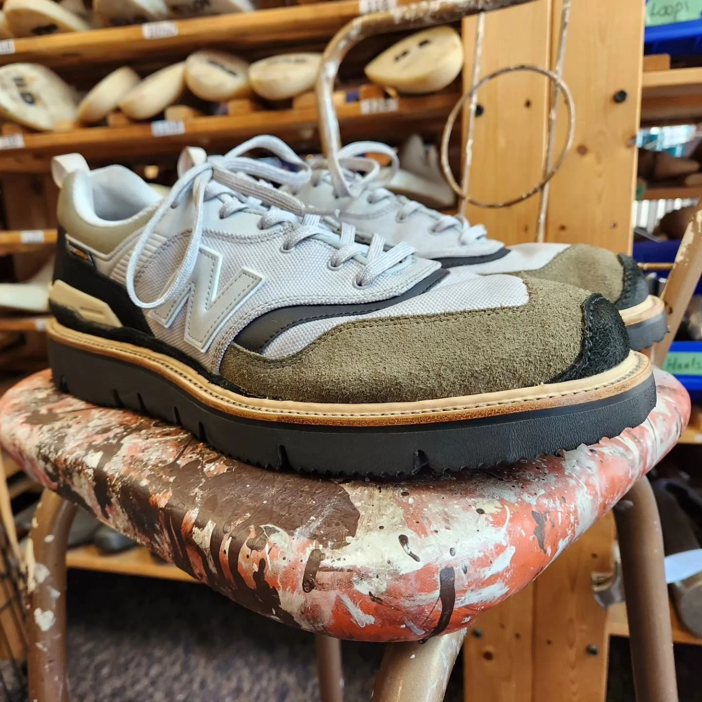 Sneakers rebuilt with rugged stitched soles