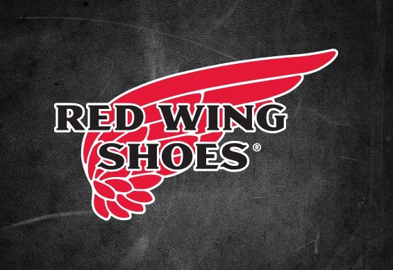 Logo of Red Wing Shoes with a red wing graphic and bold black and white text